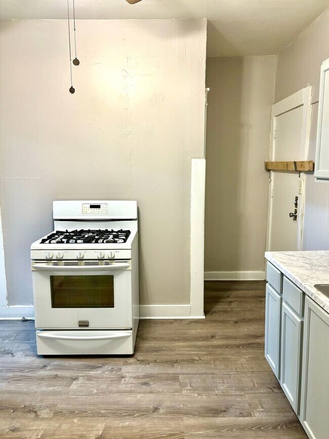 Building Photo - Updated home in West Louisville now availa...