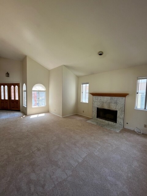 Bright living room with fire place - 2419 Clark Ln