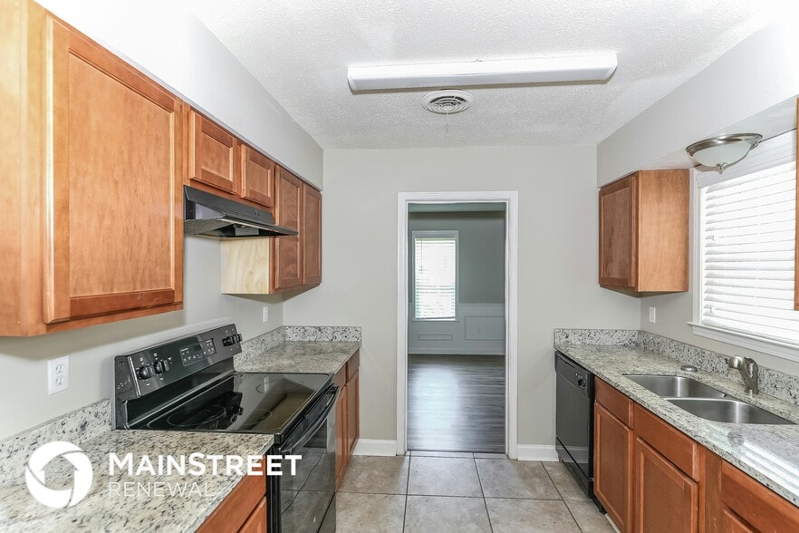 Building Photo - 6350 Limewood Ave