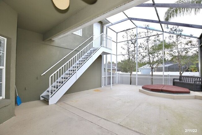 Building Photo - Luxurious 4/3 Waterfront Home with an In-ground Spa, an In-law Suite and a 2 Car Garage in the Hi...