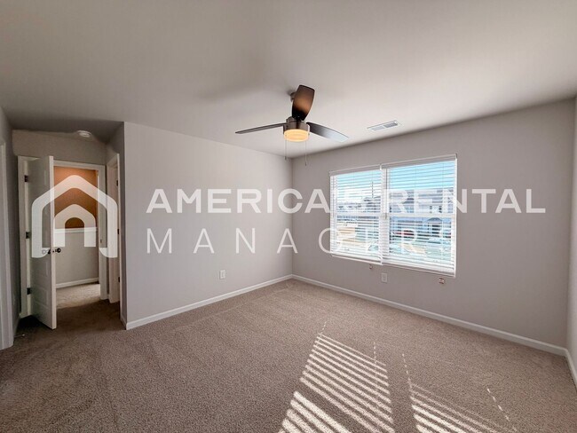 Building Photo - Spacious Two-Story Townhome with Open Layout!