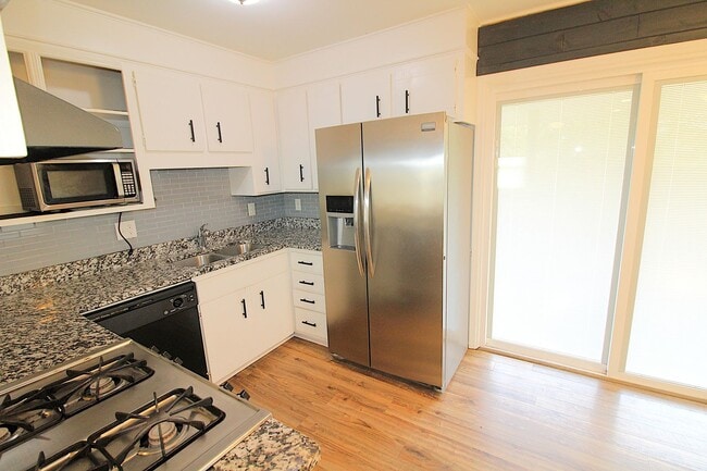 Building Photo - Remodeled 2 Bedroom with a covered porch!