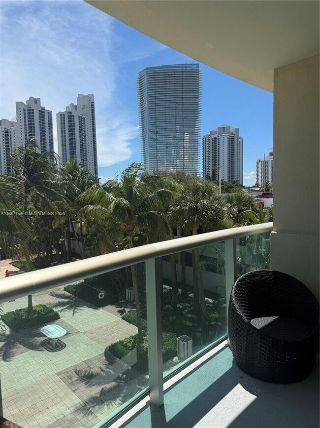 Building Photo - 19380 Collins Ave