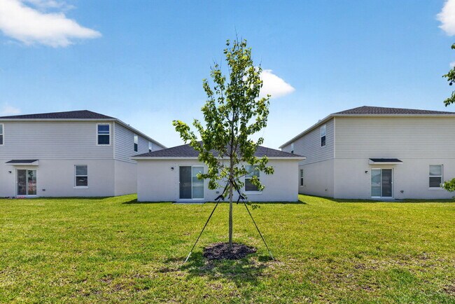 Building Photo - 5876 NW Sweetwood Dr