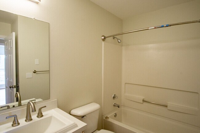 Building Photo - Major Updates: Vaulted Ceiling Spacious 2-Bed 2-Bath w DW, WD, Balcony!