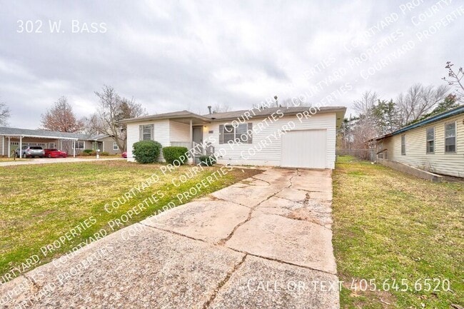 Building Photo - 302 W. Bass-