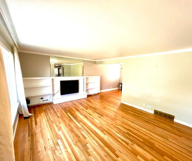 Spacious living room with gas fireplace - 3096 S Marie Cir