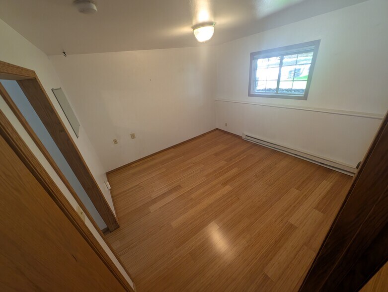 Living Room with built-in closet - 106 Spruce Ct