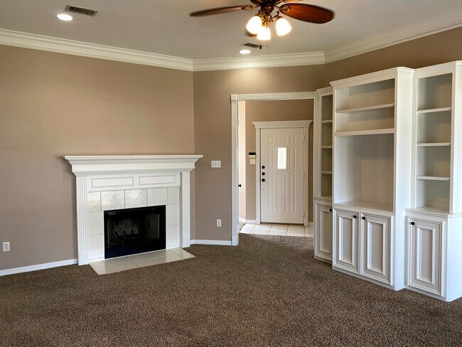 Building Photo - FABULOUS THREE BEDROOM HOME WITH LARGE DECK, FIREPLACE AND FLEX ROOM