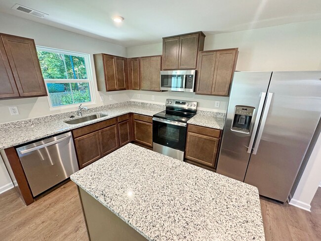 Building Photo - Gorgeous, Brand New 3-Bedroom Home with Mo...