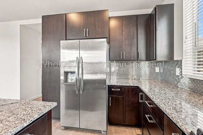 Building Photo - 9004 E 49th Pl
