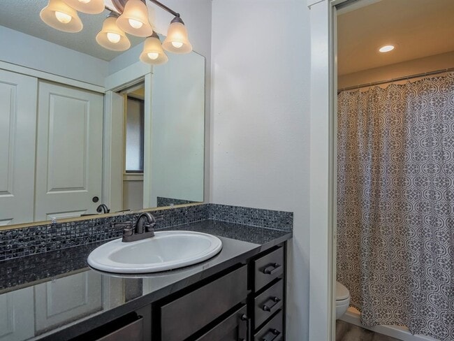 Building Photo - 4 Bedroom - Gated Community!