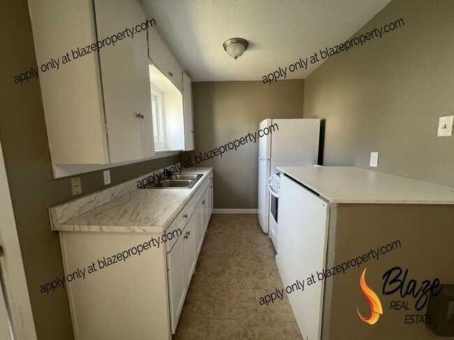 Building Photo - New Management, New Look, New You!