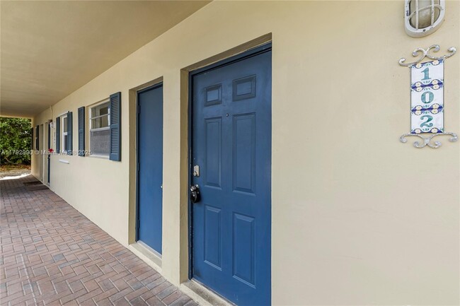 Building Photo - 1400 NE 57th Ct
