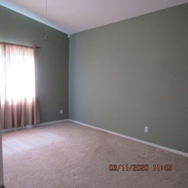 Building Photo - 3 bedroom 2 bath home with 3 car garage and RV parking