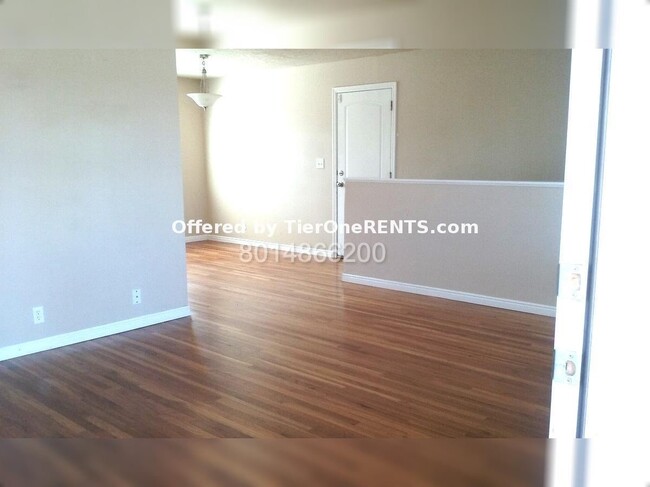 Building Photo - Charming 4-Bedroom Home with Hardwood Floo...