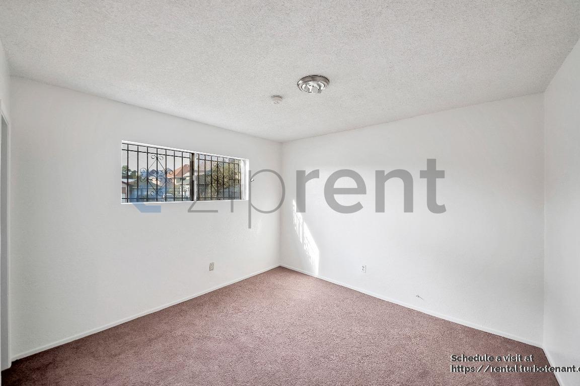 Building Photo - 2458 Normandie Ave