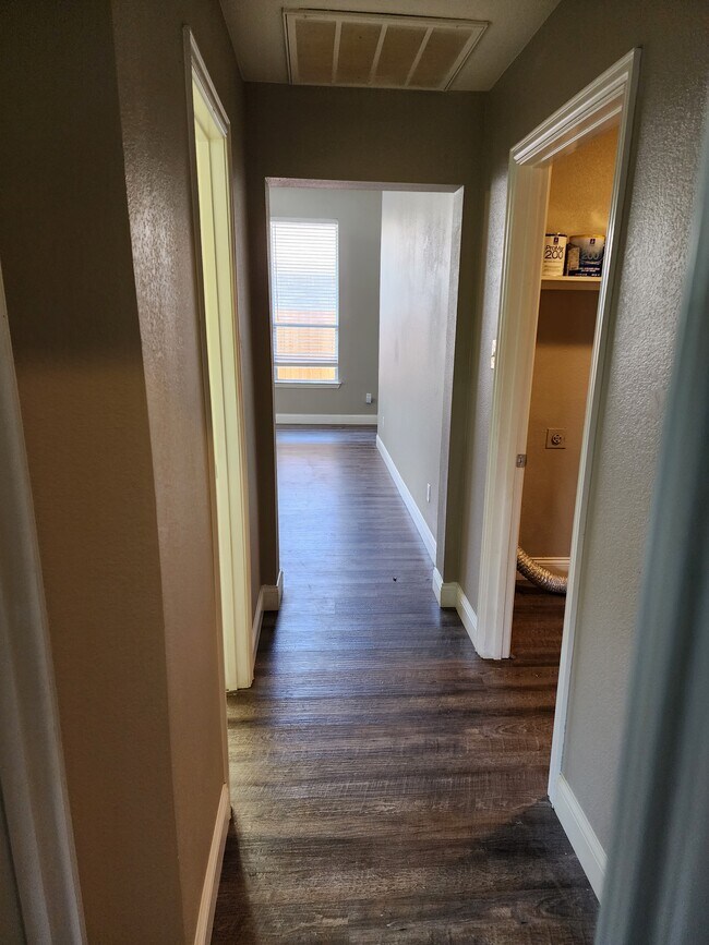 Hall to living room from bedroom 3 - 341 Port O Conner Dr