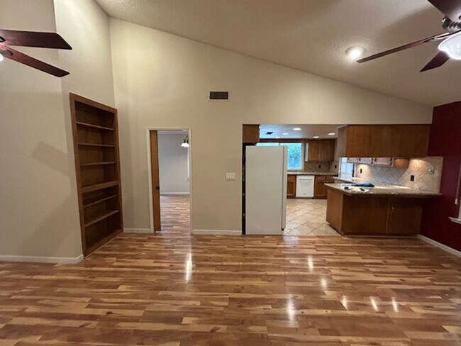 Building Photo - SW 3 Bedroom 2 Bath home with Pool. Yard Care Included.