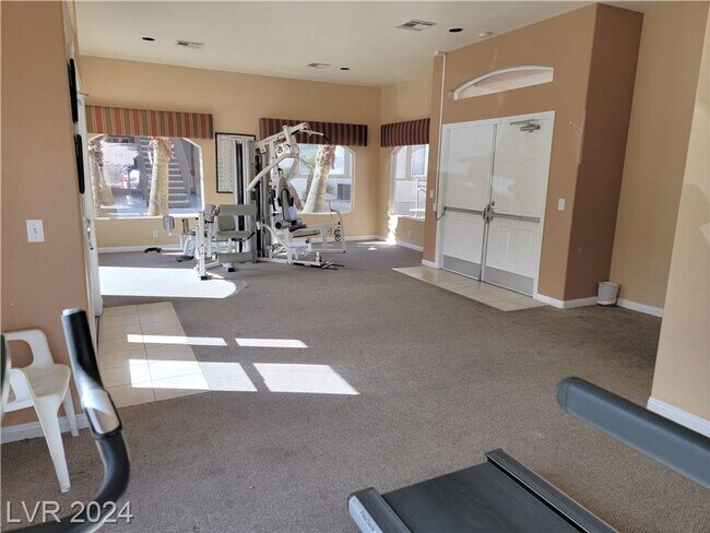 Building Photo - SECOND-FLOOR UNIT IN A GATED SOUTHWEST COM...