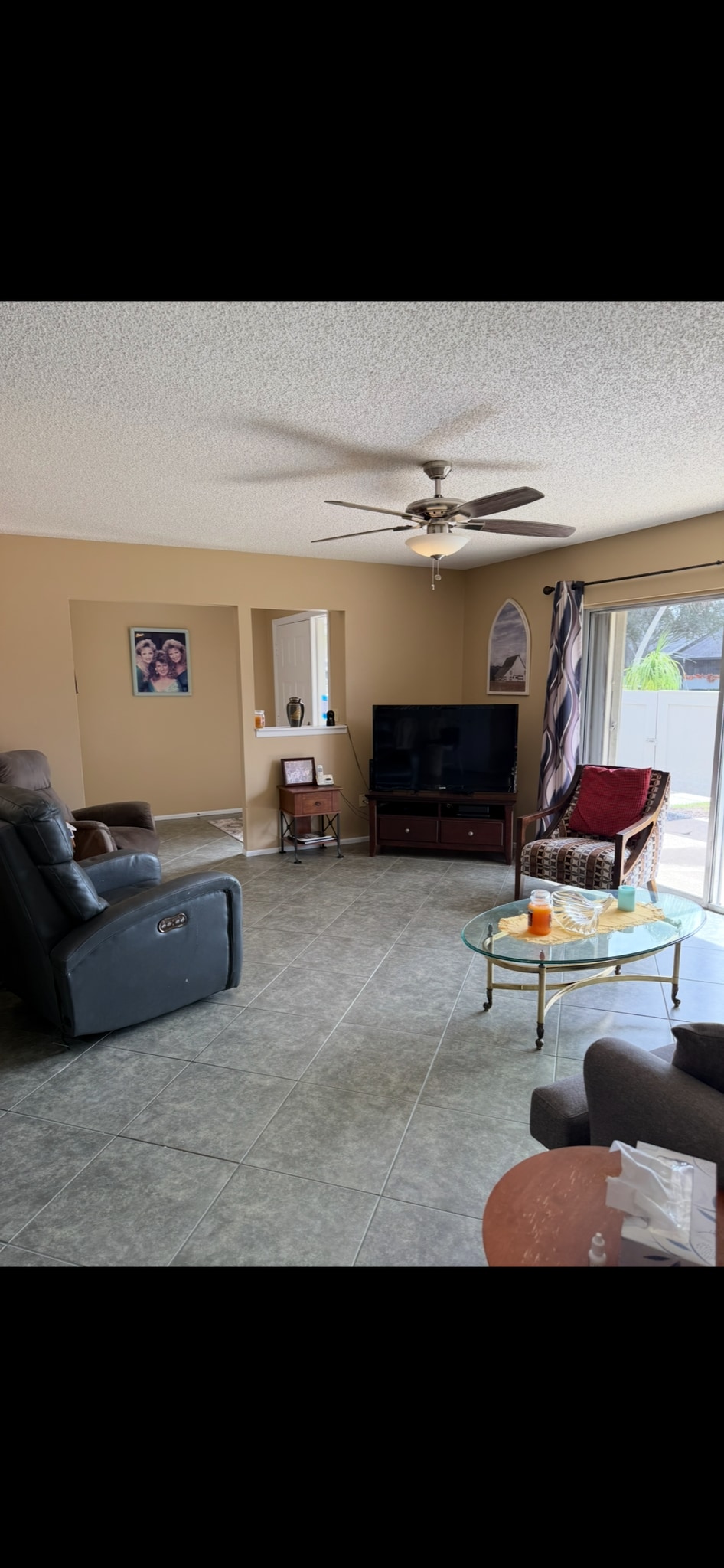 Living room with dining area - 4043 NW Cinnamon Tree Cir