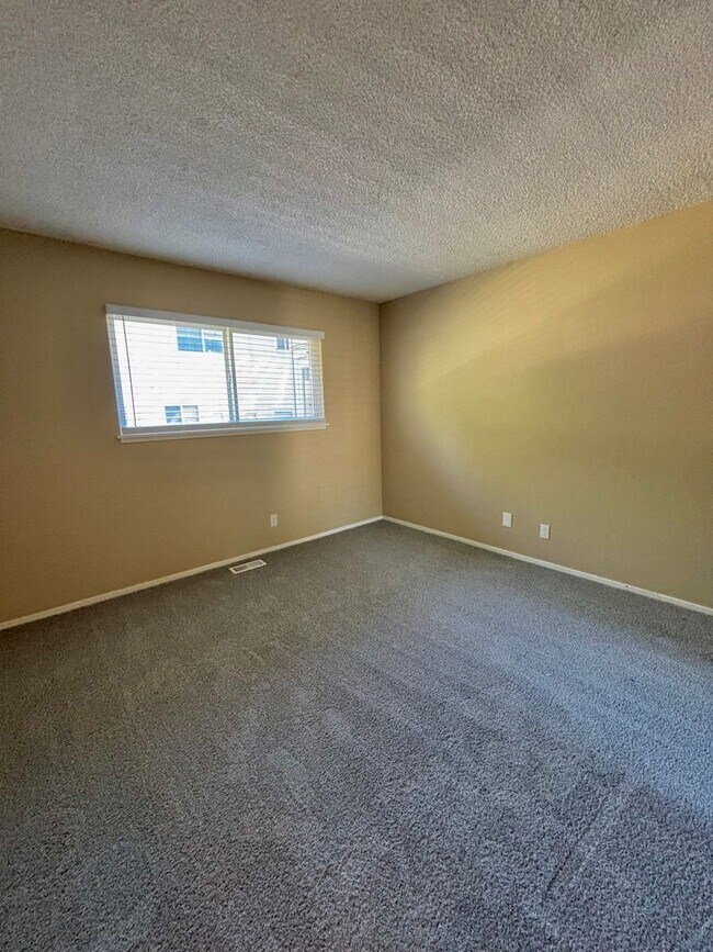 Building Photo - Live in Style! Updated Denver 2-Bedroom Townhome with Modern Design & Large 1-Car Garage!!