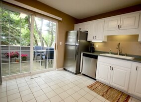 Bright kitchen that walks out to the side patio. - 15805 24th Ave N.