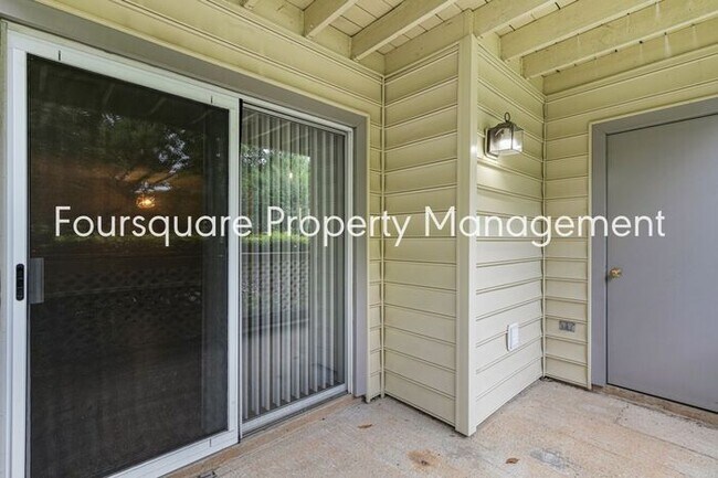 Building Photo - Charming 1st-Floor End-Unit Condo with Gas Log Fireplace, Private Back Porch & Community Pool – T...