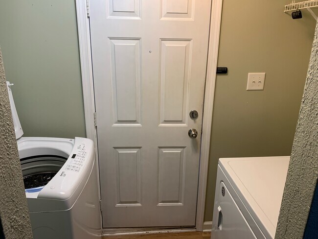 Looking at exit door through laundry room - 9356 Lamont St