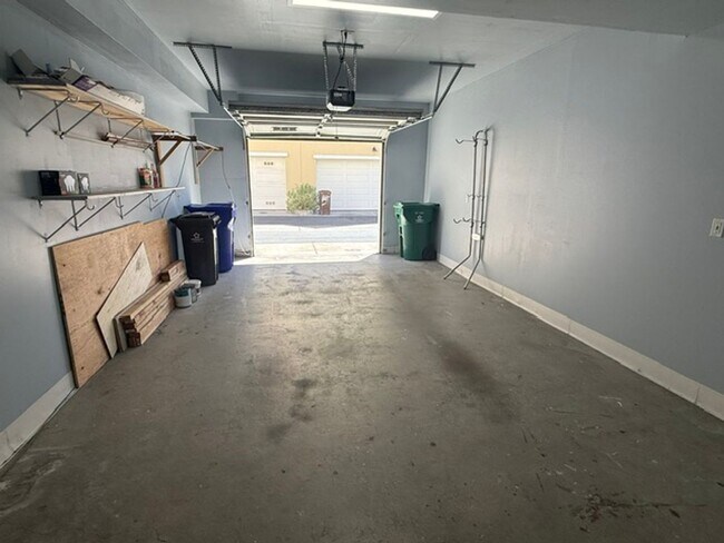 Building Photo - Large 3-Bedroom, 3.5 Bathroom Townhome in Metro Walk Village Neighborhood