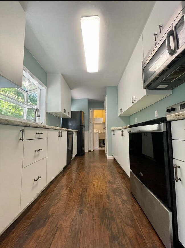 Building Photo - Updated Ranch with Large Fenced Yard, Tucked Off Walker Road~ Gas Fireplace~ Great Natural Light~...