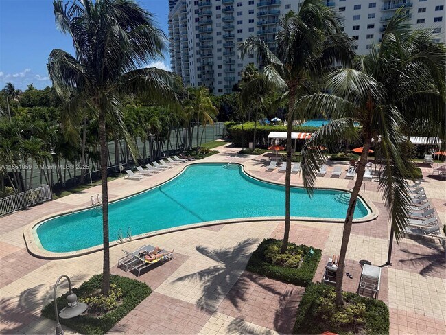 Building Photo - 19380 Collins Ave