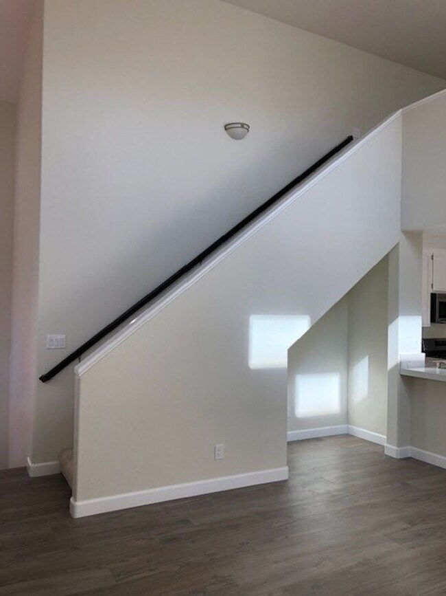 Building Photo - PICTURE PERFECT 2 BR/2 BATH PLUS LOFT END UNIT CONDO WITH DIRECT ACCESS 2 CAR GARAGE