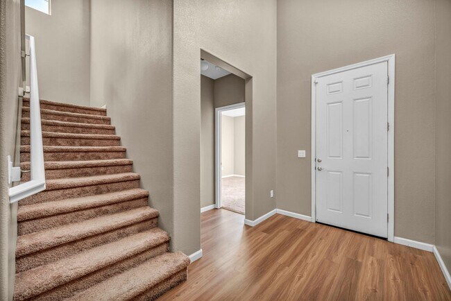 Building Photo - Sun-Filled, Spacious Living with a Three-Car Garage