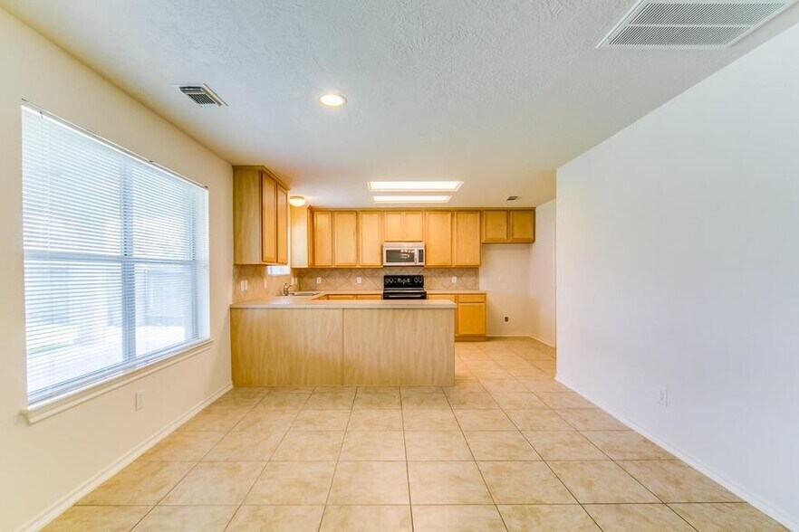 Building Photo - 8310 Coriander Ln