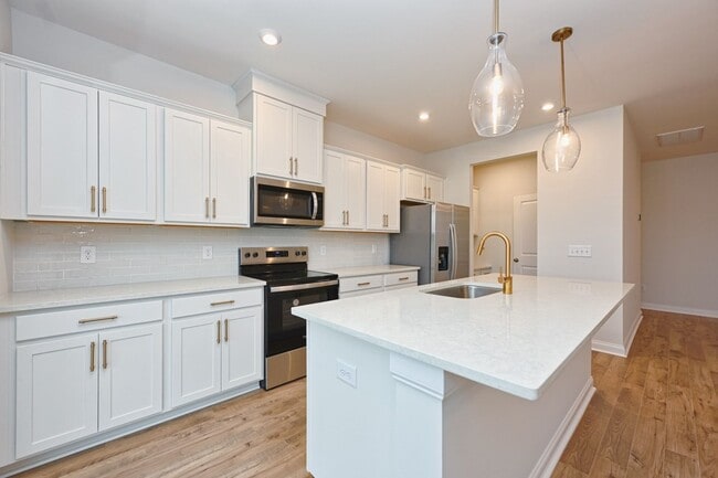 Building Photo - **BE THE LUCKY ONE TO LIVE IN THIS 2024-BUILT TOWNHOME**