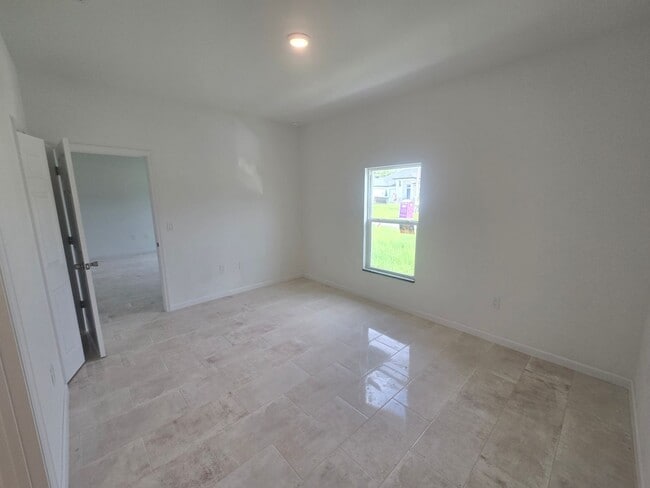Building Photo - Brand New 3 BEDROOM 2 BATH AND ONE CAR GAR...
