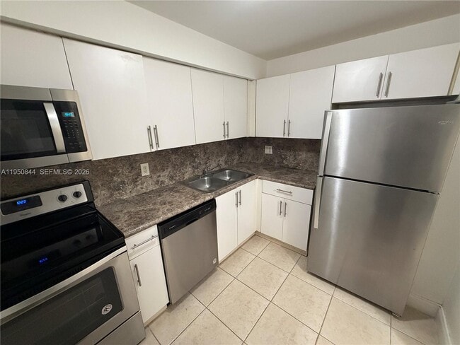 Building Photo - 4235 N University Dr