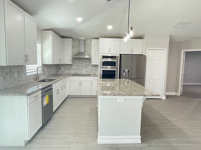 Building Photo - COMING SOON - 4/2.5/2  Home off of California Blvd.