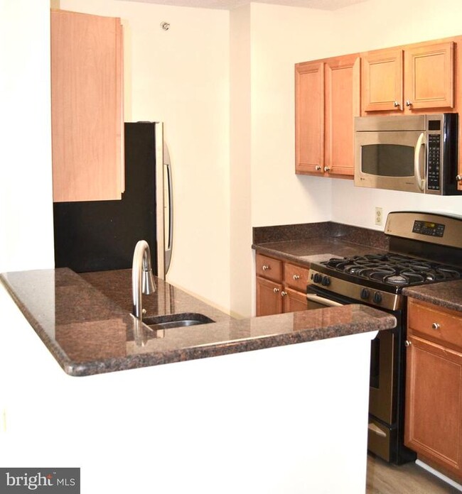 Building Photo - 7111 Woodmont Ave
