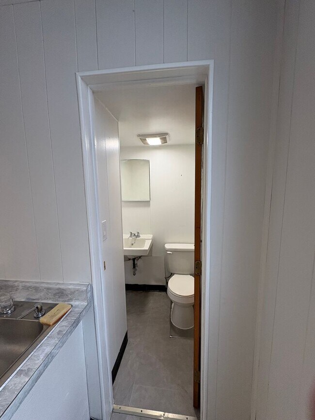 Building Photo - NORWOOD- Cute 2 bedroom 1.5 baths with fenced yard