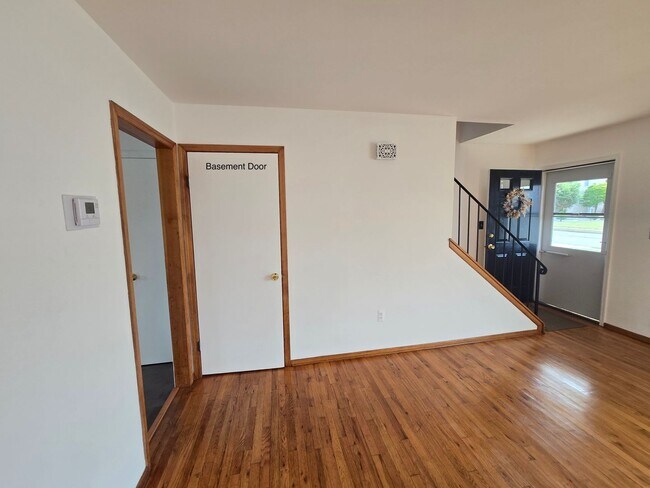 Building Photo - Updates abound at this SPACIOUS, half duplex with 3+ off-street parking spots, 3-bedrooms and 2 f...