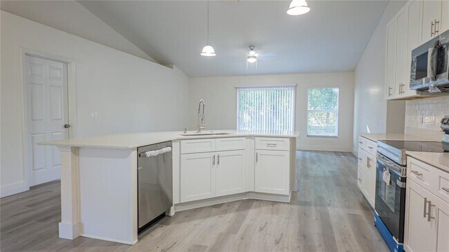 Building Photo - 4395 NE 33rd Ave