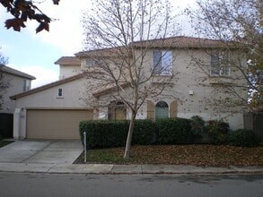 Building Photo - Natomas 4bd/2.5bth Single Family Home