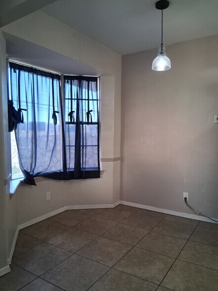 Building Photo - 6917 Alto Rey Ave Apt B