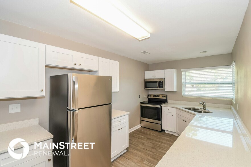 Building Photo - 6260 Merrill Rd