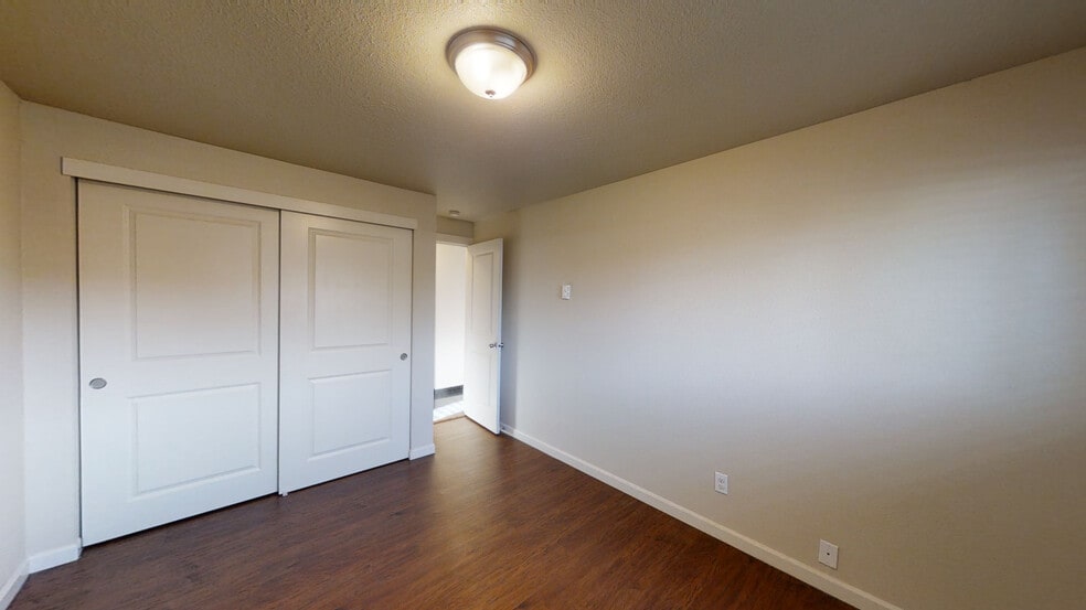 Bedroom with Plank Floors - 318 120th St S