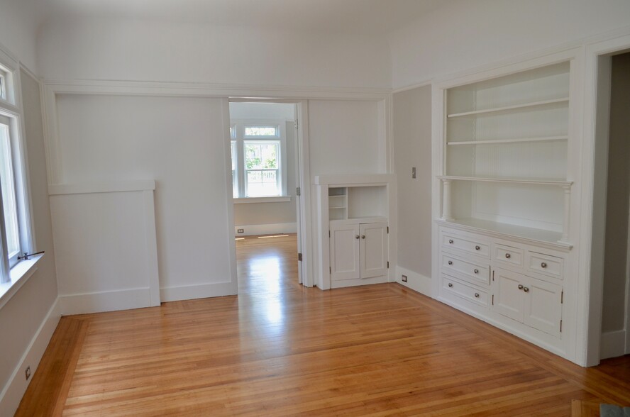 another view of living room into primary bedrrom - 568 Merrimac St