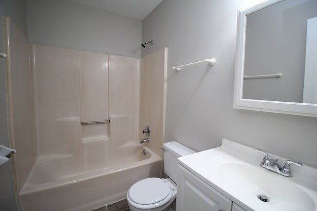 Building Photo - Ready Now Updated Two Bedroom Apartment with Wood Look Flooring and New Appliances & ½ OFF FIRST ...