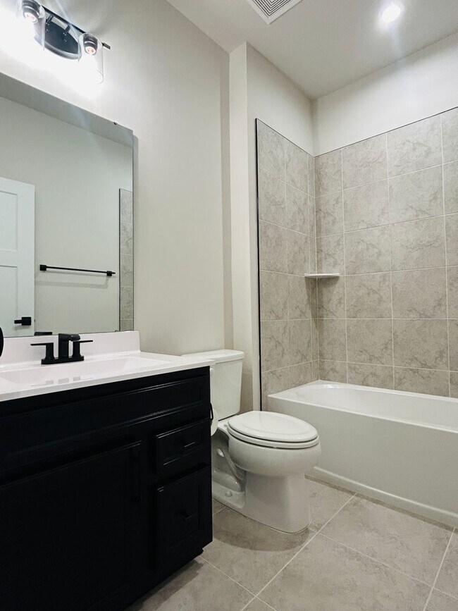 Building Photo - New Construction • 4 BR • 2 Full / 2 Half BA • End Unit Townhome in Village Town – Fayetteville’s...